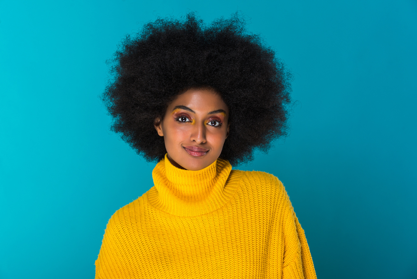 Beautiful african young woman in studio
